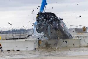 rivian crashes barrier