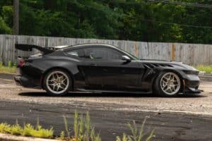 black mustang gtd with gold wheels (1)