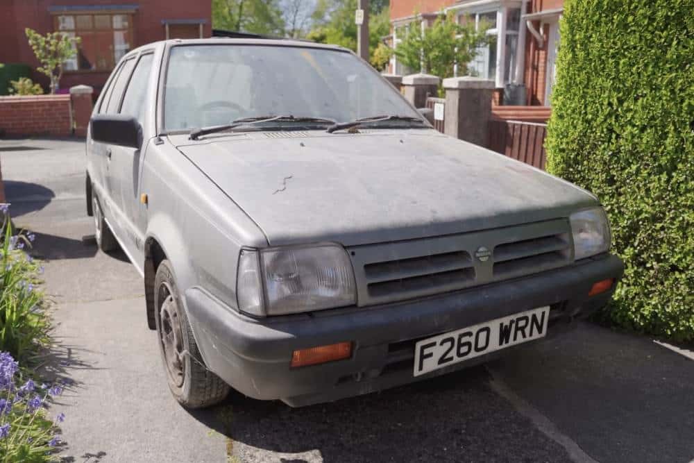 https://cdn.autogreeknews.gr/wp-content/uploads/2026/06/abandoned-nissan-micra-k10-1.jpg