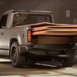slate-truck-exterior-rear-carrying-plywood-sheets