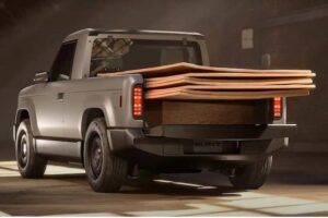 slate-truck-exterior-rear-carrying-plywood-sheets
