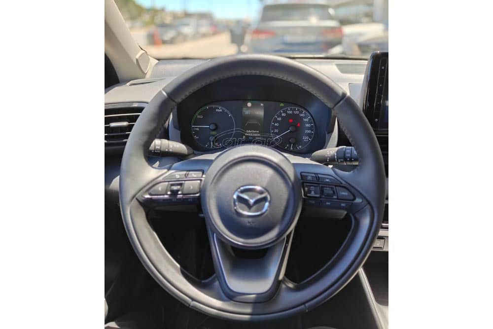 https://cdn.autogreeknews.gr/wp-content/uploads/2026/07/Mazda2-Hybrid-2025-used-7.jpg